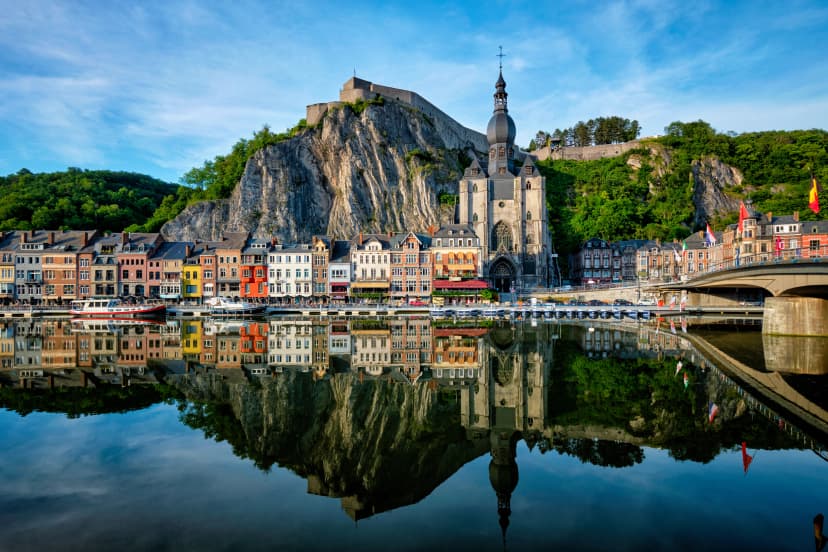Picturesque Dinant town, Dinant Citadel and Collegiate Church of Notre Dame de Dinant and Pont Charles de Gaulle bridge over Meuse river. Belgian province of Namur, Blegium